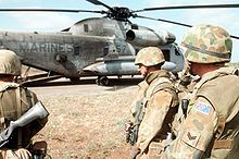 Australian soldiers prepare to board a US Marine Corps helicopter in Somalia